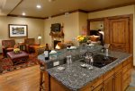 730-square-foot suite is located on the garden level, full kitchen 